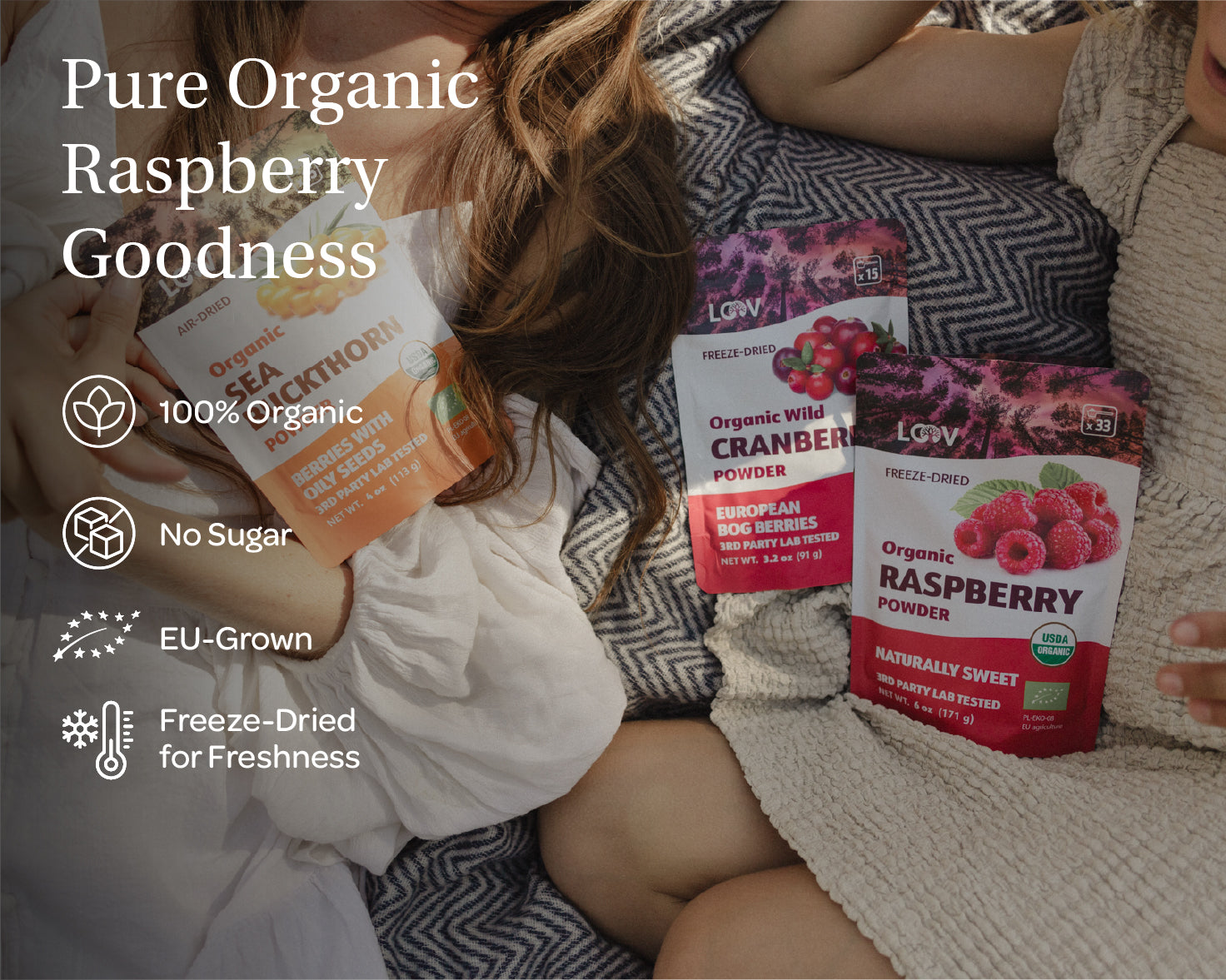 “A stand-up pouch of LOOV Freeze-Dried Organic Raspberry Powder with red and white packaging, showing raspberries on the front. Beside the pouch is a small heap of bright red raspberry powder.”