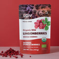 “A stand-up pouch of LOOV Freeze-Dried Organic Whole Wild Lingonberries in red and white packaging, with the words ‘Organic Wild LINGONBERRIES Whole Berries’ and a small pile of red freeze-dried berries positioned in front of the pouch.”