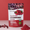 “A stand-up pouch of LOOV Freeze-Dried Organic Wild Cranberry Powder, with white and deep red packaging showing fresh cranberries on the front. A small mound of vibrant red powder sits in front of the bag.”